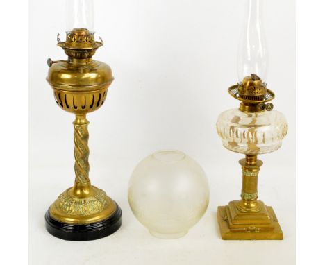 A 19th century brass oil lamp with brass reservoir, wrythen decorated support and circular base on circular plinth, with oval