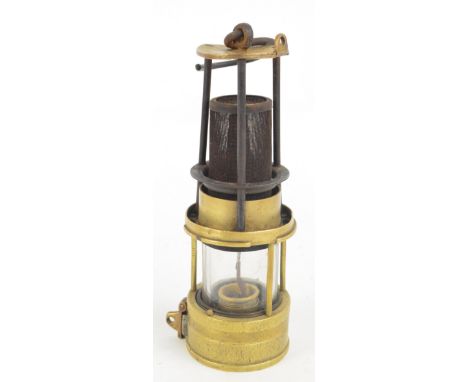 A Richard Johnson Clapham & Morris of Manchester & Liverpool Muesler miner's safety lamp, height 22.5cm.