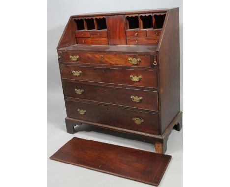 A George III mahogany bureau, the fall enclosing a fitted interior, above four graduated drawers, each with brass drop handle