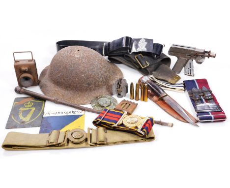 Various military belts, to include The Royal Logistic Corp buckle 8cm wide, various spelt bullets, tin helmet, Milbro Kampa d