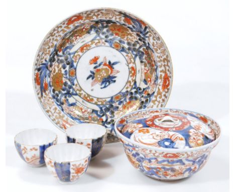 A 19thC Imari dish, of circular outline, typically decorated with flowers with gilt highlights and partially decorated verso,