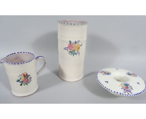 An early 20thC Carter Stabler and Adams Poole vase, of cylindrical outline sparsely decorated with flowers and an upper turqu