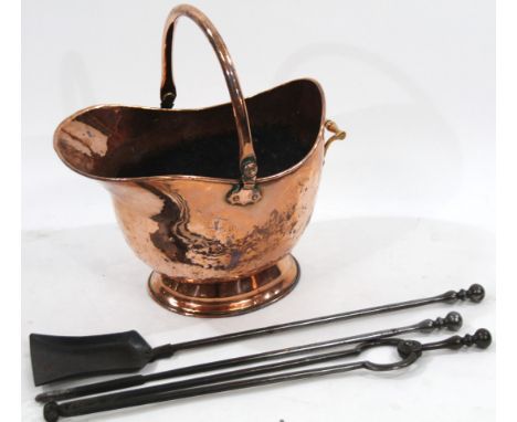 A Victorian copper helmet shaped coal scuttle, together with three steel fire irons, comprising tongs, shovel and poker, 71cm