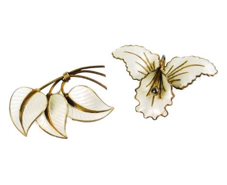 An Aksel Holmsen silver and enamel orchid brooch, together with an Albert Scharning silver and enamel three leaf brooch.