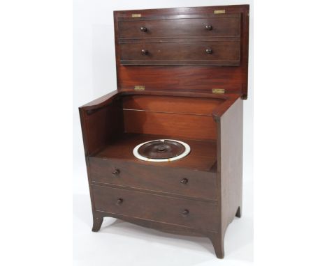 A 19thC mahogany commode chest, with hinged folding lid and dummy drawer front with small turned knop handles, enclosing the 