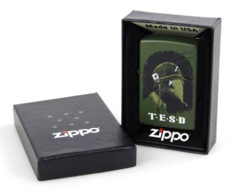 A Zippo TESD lighter, 6cm high, with paperwork. (boxed)