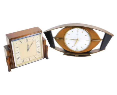 A mid 20thC 8-day mantel clock, in stylized oak case by Garrard, 15cm H, and a Metamic 1960's mantel clock, 16cm high. (2) 