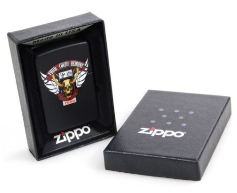 A Zippo four colour Demans 15C American lighter, 5cm high. (boxed, with papers)