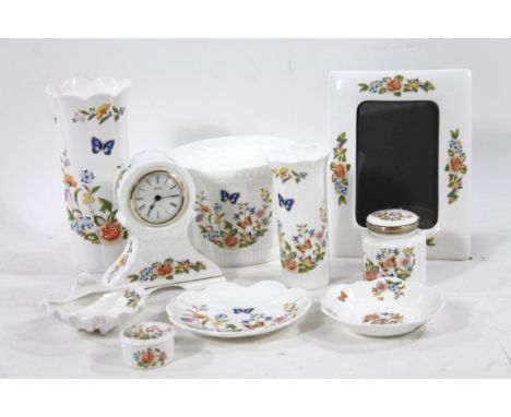A small collection of Aynsley porcelain Cottage Garden pattern items, including a mantel clock, fern pot, photo frame, etc. (
