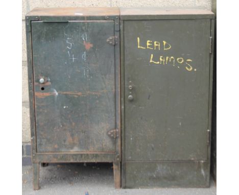 A mid 20thC metal freestanding tool cabinet, the hinged front revealing a succession of pull out drawers containing various t