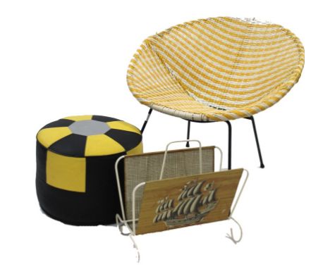 A 1960's tub chair in white and yellow woven plastic, a 1960's vinyl covered harlequin pouffe and a period metal magazine rac