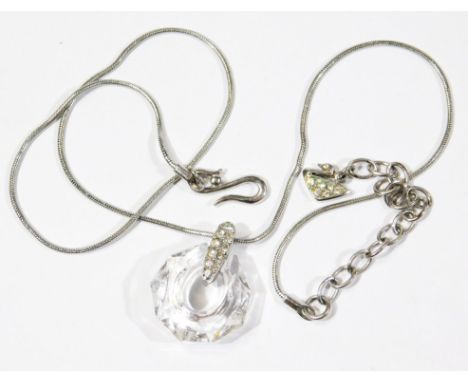 A modern Swarovski crystal necklace, with crystal drop pendant, and centre stone set drop, with Swarovski crystal bag. 