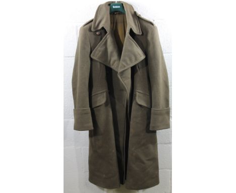 A 20thC army issue trench coat, three quarter length with shoulder buttons, probably WWI, size unknown.