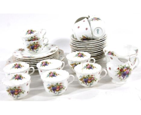 An early 20thC Royal Doulton tea service, decorated with sprays of flowers, comprising bread plate, cream jug, sugar bowl, tw