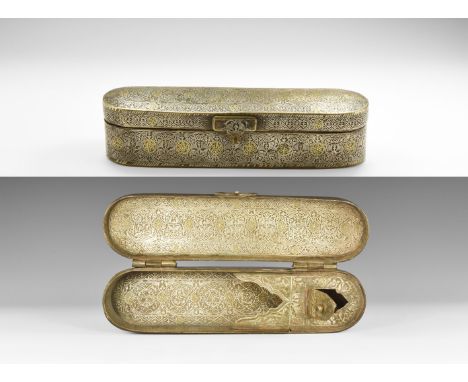 14th-16th century AD. A large brass pen box of rectangular shape with rounded corners, composed of a main body, a lid with tw