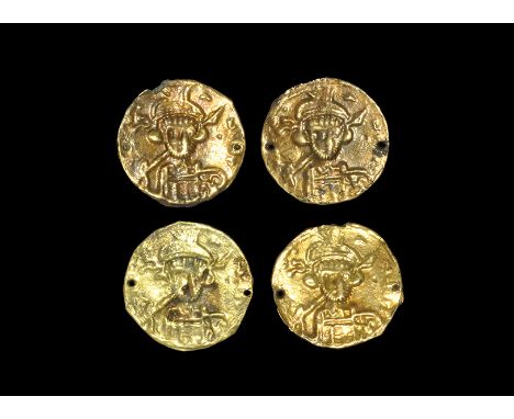 7th century AD. A set of four sheet-gold monofacial repoussé bracteates, each with the facing bust of a Byzantine Holy Empero