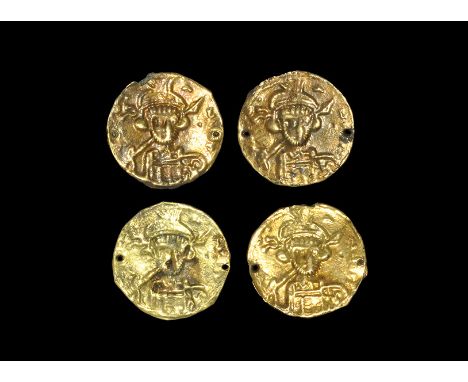 7th century AD. A set of four sheet-gold monofacial repoussé bracteates, each with the facing bust of a Byzantine Holy Empero