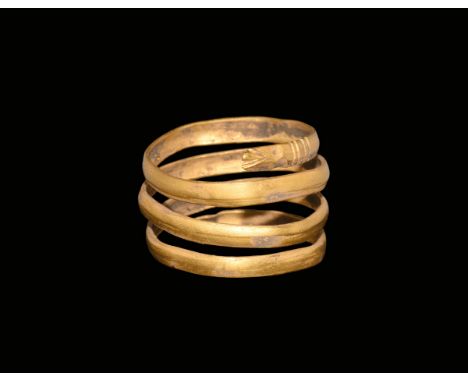1st century AD. A flat-section gold band coiled in three passes, snake-head detail to each end. Cf. Ruseva-Slokoska, L. Roman