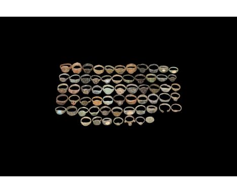 1st-16th century AD. A mixed group of bronze finger rings and fragments.   223 grams total, 20-25mm (3/4 - 1"). Private colle