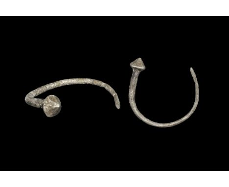 9th-10th century AD. A tapering round-section silver pin with pointed biconical finial.   4.59 grams, 34mm (1 1/4"). Acquired