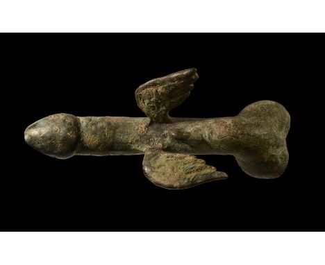 1st-3rd century AD. A large bronze phallic pendant with an attachment loop between a pair of wing to the top.   86 grams, 74m