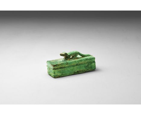Late Period, 664-332 BC. A hollow-formed bronze miniature sarcophagus for the mummy of a shrew with rib below the rim, to the