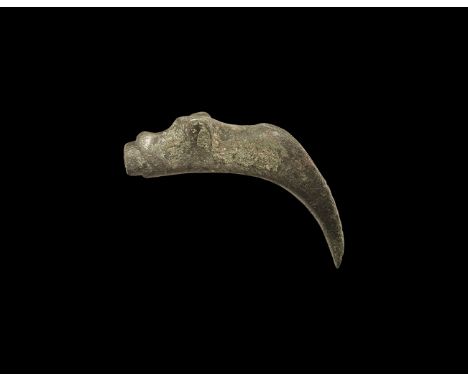 12th-14th century AD. A bronze hollow-cast laver spout formed as a dog's head with D-shaped ears and angular muzzle, pipe iss
