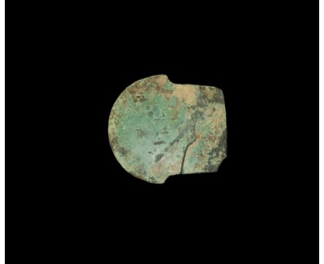 1st millennium BC. A very large heavy flat axehead with small flanges to the side, body widens to the centre.   1.82 kg, 19cm