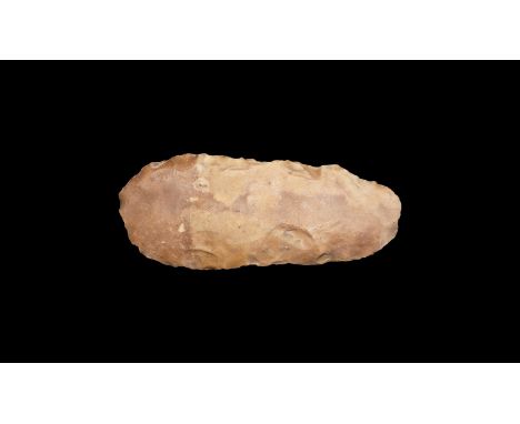 Upper Palaeolithic, 50,000-10,000 years BP. A knapped chert handaxe with rounded butt and tapering point, old label marked '.
