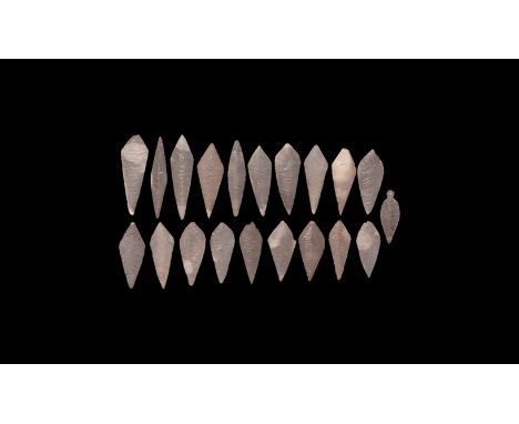 Neolithic, 3rd-2nd millennium BC. A group of twenty pale grey flint bifacial leaf-shaped knapped and ground points.   121 gra