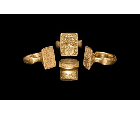 16th-18th century AD. A substantial gold glove ring with round section shank inscribed at the rounded shouders with letter 'M
