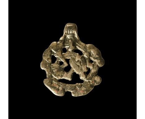 10th-11th century AD. A silver-gilt pendant with Borre-style beast and integral suspension loop; the openwork plaque with thr