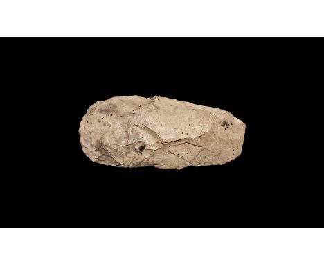 Upper Palaeolithic, 50,000-10,000 years BP. A lentoid-section handaxe with rounded edge and square butt, old label marked 'Si