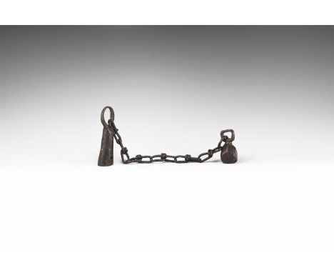 12th-15th century AD. A set of iron fittings for a flail comprising: hand-forged tubular socket with overlapped closure, flat