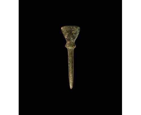 2nd millennium BC. A sturdy bronze chisel with D-shaped blade, chamfered edge, square-section tapering shank with collar behi