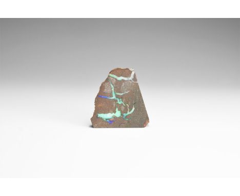 An attractive specimen of precious opal in ironstone matrix with one side polished, the opal exhibiting flashes of green, and