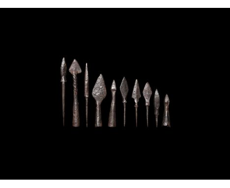 10th-15th century AD. A mixed iron group comprising: four tanged arrowheads with leaf-shaped blades; two square-section tange