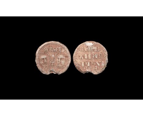 1378-1389 AD. A discoid lead papal bulla of Urban VI with two bearded faces to one face separated by a cross, 'SPA.SPE' above