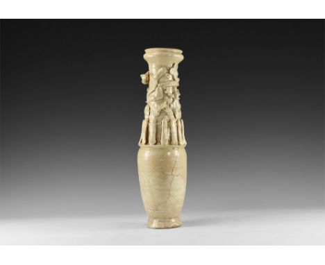 Song Dynasty, 960-1127 AD. A cream-glazed ceramic granary jar with rosette appliqués and undulating dragon to the neck above 