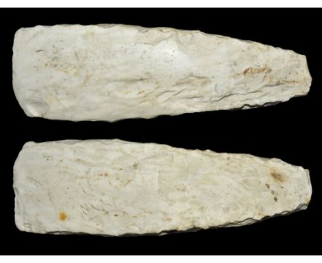 Neolithic, 5th-3rd millennium BC. An unusually large bifacial flint axe with squared sides and a thick butt, the slightly con