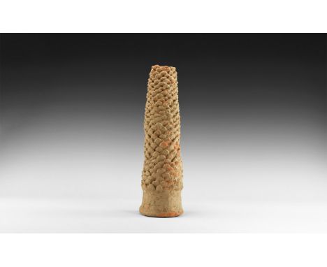 1st-4th century AD. A tapering ceramic cylinder with flared base, scaly palm tree texture, central socket.   1.5 kg, 29.5cm (