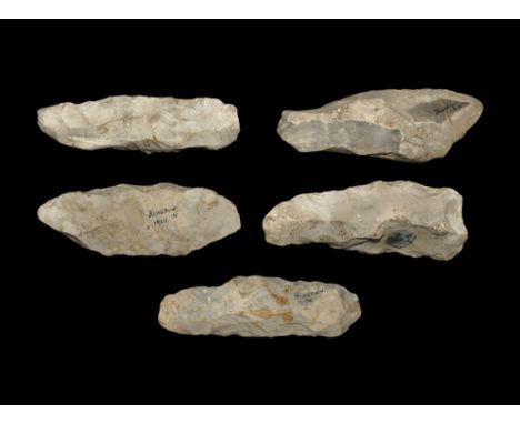 Mesolithic, 17,000-10,000 BP. A group of four well-knapped flint pick-type axes and another heavy-keeled implement of general