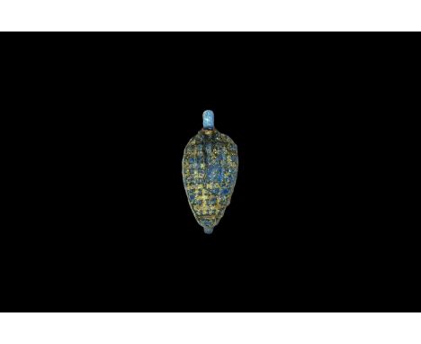 Amarna Period, 1353-1336 BC. A glazed composition amuletic pendant of a bunch of grapes with suspension loop above and anothe