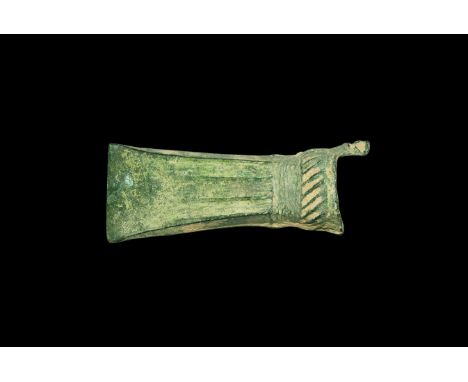 2nd millennium BC. A bronze European axehead with straight edge, square-section chamfered blade with ribs to both broad faces