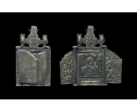 19th century AD. A bronze icon of the Virgin Kazanskaya and the infant Jesus, openwork panel and suspension ring above; two f