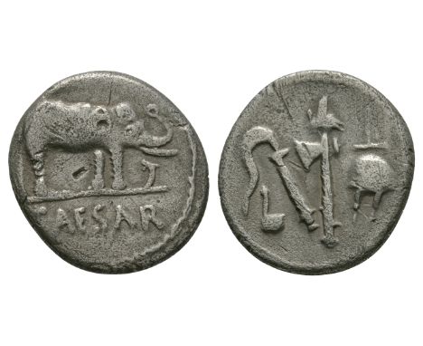 49-48 BC. Obv: CAESAR legend in exergue with elephant right, trampling on serpent. Rev: sacrificial implements: simpulum, spr