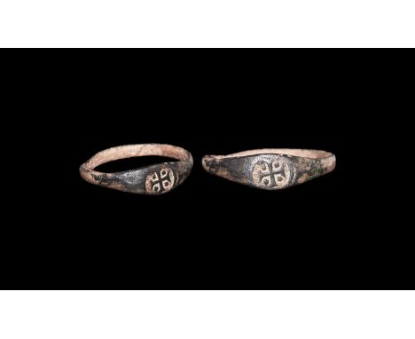 6th-8th century AD. A bronze D-shaped hoop with stamped Maltese cross to the tear-shaped bezel.   1.36 grams, 20.61mm overall