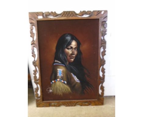 Embellished print of a native woman on canvas with a carved frame