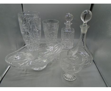 Cut glass decanter, vases, fruit bowl, jug and ladle plus ships decanter