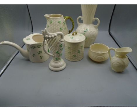 Belleek shamrock and basket weave vase, jug, harp and lidded pot. A mini jug and sugar bowl with shell design and a similar H